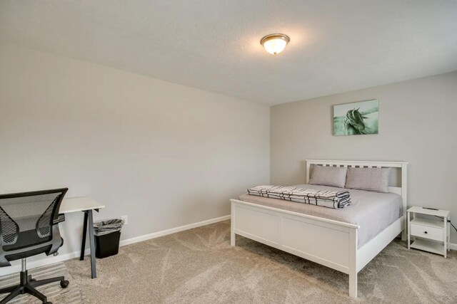 3120 Wayne Dr, Evans, GA 30809 - bedroom featuring light carpet, a desk, and baseboards