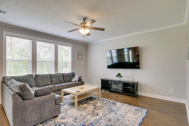3120 Wayne Dr, Evans, GA 30809 - living room with a ceiling fan, baseboards, wood finished floors, and crown molding