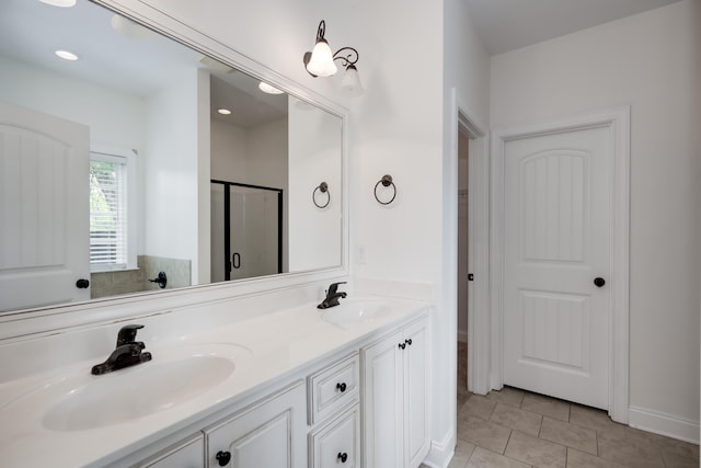 750 Herrington Dr, Grovetown, GA 30813 - full bathroom with tile patterned floors, a shower stall, double vanity, and a sink