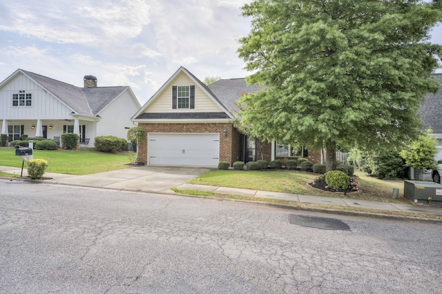 750 Herrington Dr, Grovetown, GA 30813 - view of front of house featuring brick siding, driveway, roof with shingles, a front yard, and an attached garage