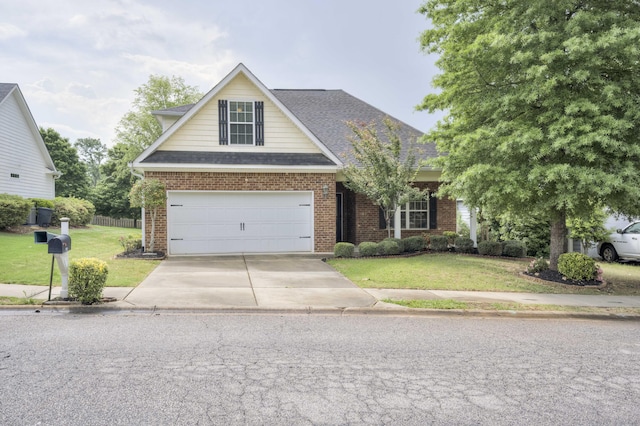 750 Herrington Dr, Grovetown, GA 30813 - traditional-style home with brick siding, fence, a front lawn, and concrete driveway