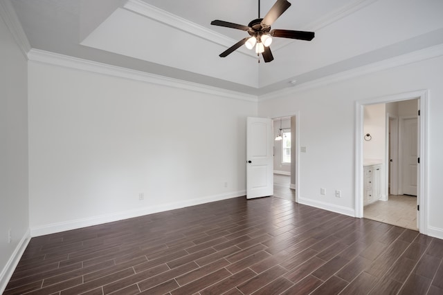 750 Herrington Dr, Grovetown, GA 30813 - unfurnished bedroom featuring dark wood-style floors, baseboards, a raised ceiling, and crown molding