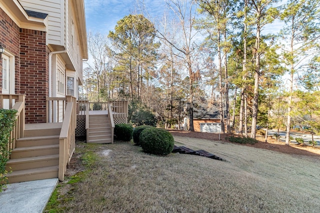 view of yard featuring a deck