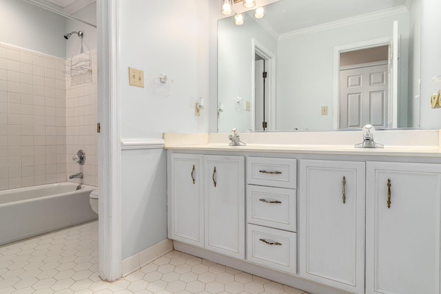 bathroom with crown molding, vanity, tile patterned floors, and tiled shower / bath