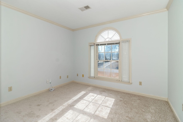 carpeted empty room with ornamental molding