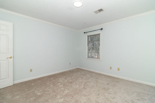 spare room with crown molding and light colored carpet