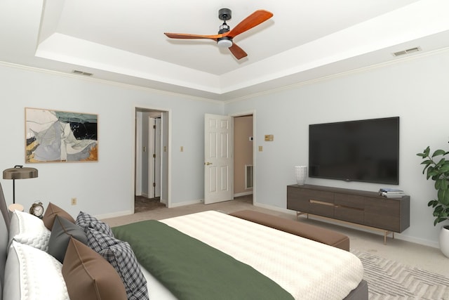 bedroom with light carpet, ceiling fan, and a tray ceiling