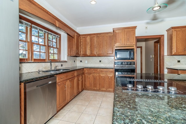 kitchen featuring crown molding, light tile patterned floors, sink, and black appliances