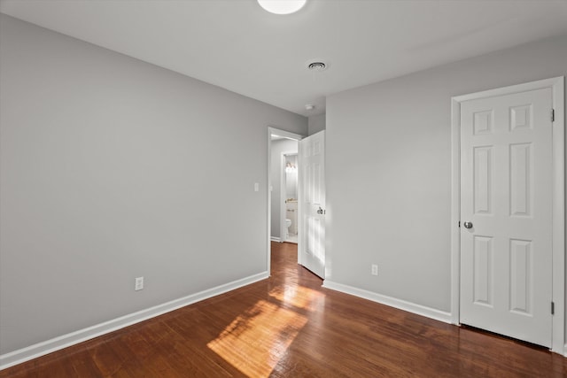 2131 Reedale Ave, Augusta, GA 30906 - unfurnished bedroom with wood finished floors and baseboards