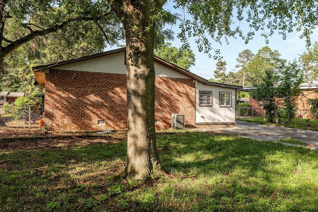 2131 Reedale Ave, Augusta, GA 30906 - view of side of property featuring brick siding and central air condition unit