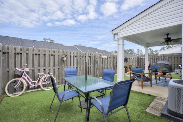 view of patio / terrace with central AC and ceiling fan