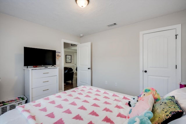 bedroom featuring a textured ceiling