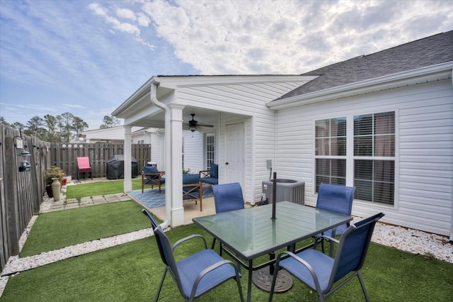 view of patio featuring central AC, ceiling fan, and grilling area