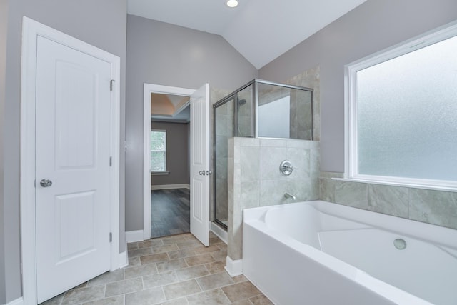 809 Richards Ct, Grovetown, GA 30813 - full bathroom with a bath, a stall shower, vaulted ceiling, and tile patterned floors