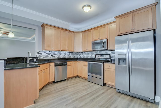 809 Richards Ct, Grovetown, GA 30813 - kitchen with stainless steel appliances, light brown cabinets, light wood-style flooring, crown molding, and backsplash