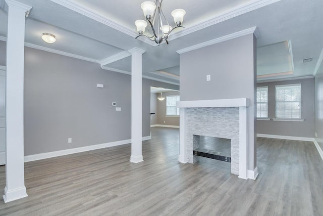 809 Richards Ct, Grovetown, GA 30813 - unfurnished living room featuring wood finished floors, ornamental molding, a fireplace, and a chandelier