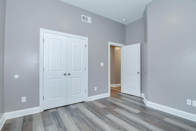 809 Richards Ct, Grovetown, GA 30813 - unfurnished bedroom with wood finished floors and a closet