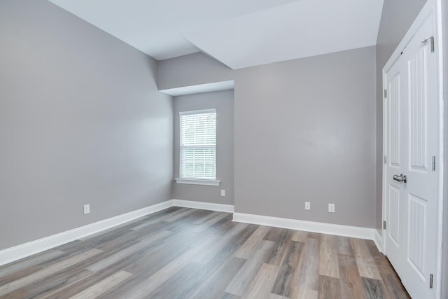 809 Richards Ct, Grovetown, GA 30813 - unfurnished bedroom with wood finished floors and baseboards