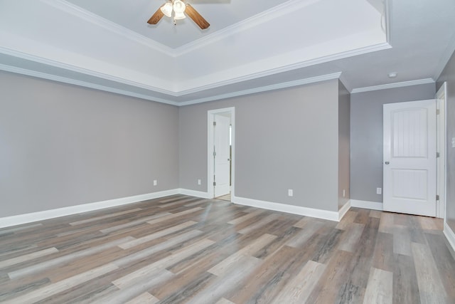 809 Richards Ct, Grovetown, GA 30813 - unfurnished room with wood finished floors, ceiling fan, crown molding, and a tray ceiling