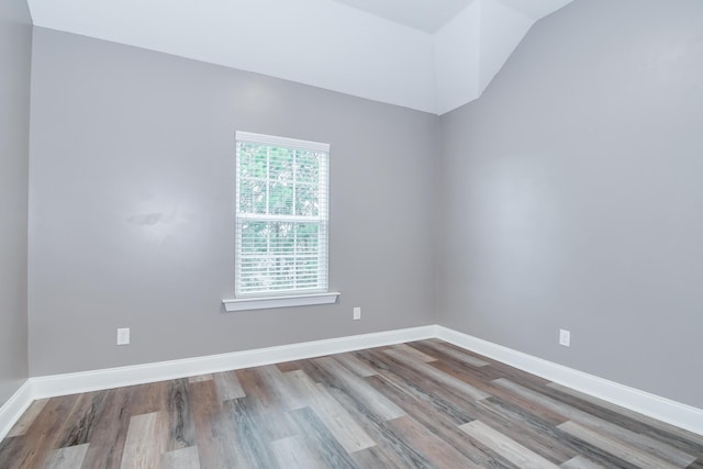 809 Richards Ct, Grovetown, GA 30813 - spare room featuring wood finished floors and vaulted ceiling