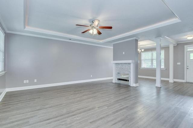 809 Richards Ct, Grovetown, GA 30813 - unfurnished living room with a raised ceiling, crown molding, ceiling fan, a fireplace, and wood finished floors