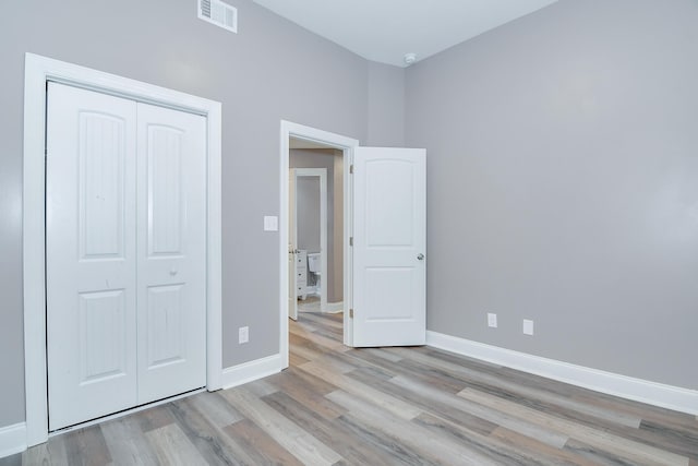 809 Richards Ct, Grovetown, GA 30813 - unfurnished bedroom with wood finished floors and a closet