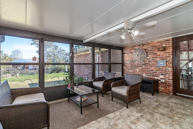 sunroom / solarium with ceiling fan