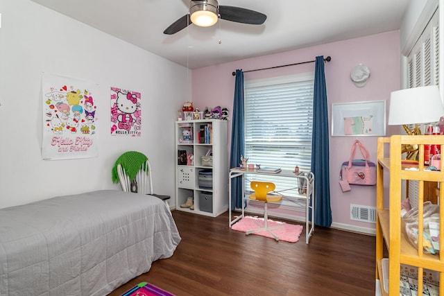 bedroom with visible vents, ceiling fan, and wood finished floors