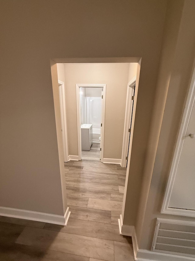 2216 Martin Rd, Augusta, GA 30906 - hallway with baseboards and light wood-style floors