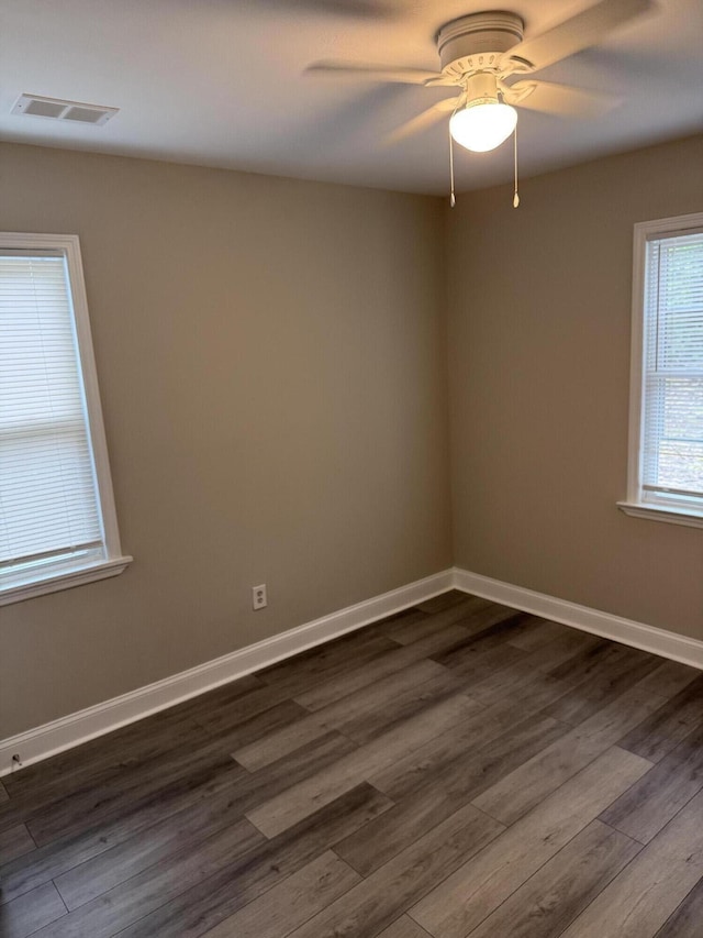 2216 Martin Rd, Augusta, GA 30906 - empty room with dark wood-style floors, ceiling fan, and baseboards