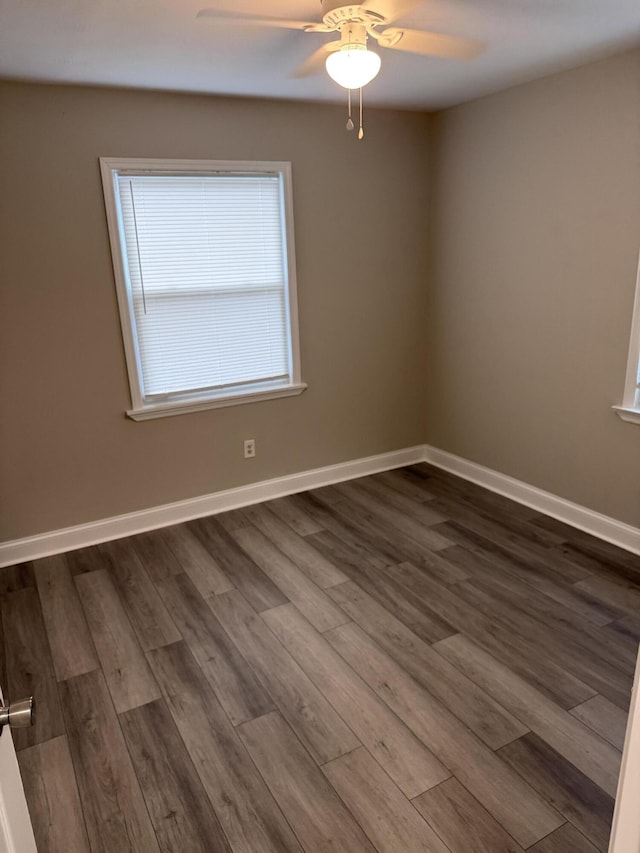 2216 Martin Rd, Augusta, GA 30906 - unfurnished room featuring a ceiling fan, dark wood-type flooring, and baseboards