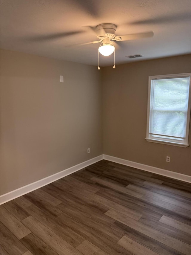 2216 Martin Rd, Augusta, GA 30906 - spare room with dark wood-style floors, a ceiling fan, and baseboards