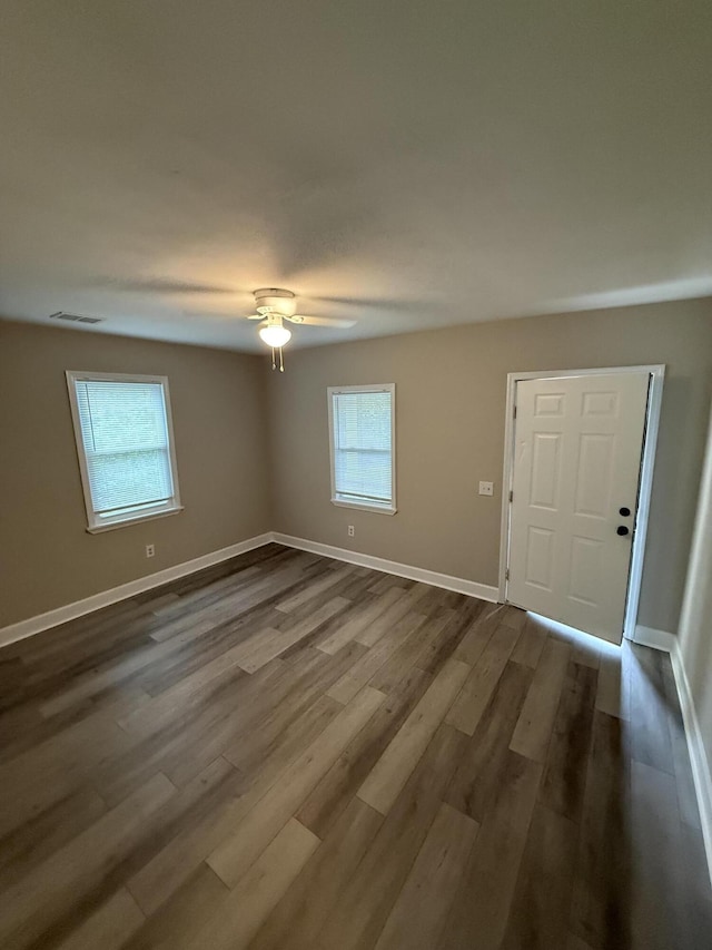 2216 Martin Rd, Augusta, GA 30906 - foyer entrance with dark wood-style flooring, ceiling fan, and baseboards
