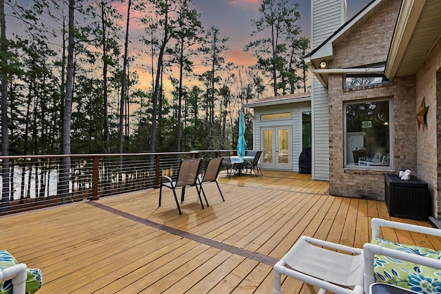 deck at dusk with french doors