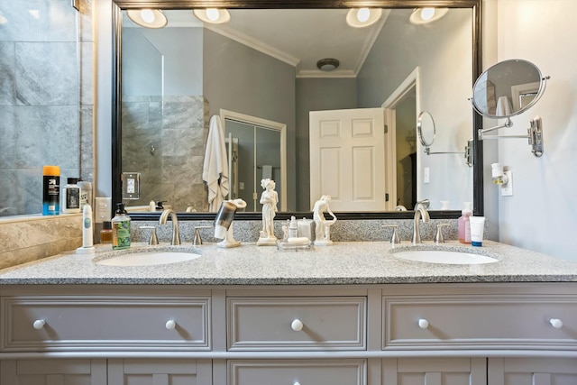 full bathroom with double vanity, ornamental molding, and a sink