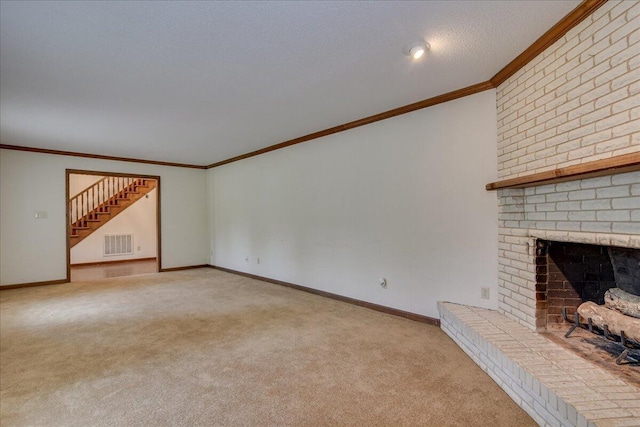 unfurnished living room featuring light carpet, crown molding, and a brick fireplace