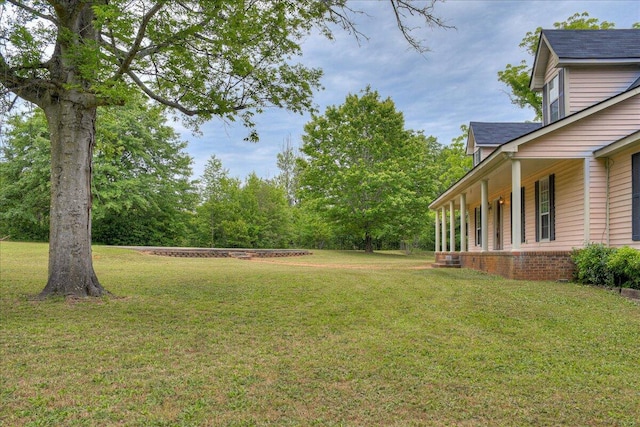 view of yard with a porch