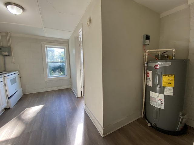 utility room featuring water heater