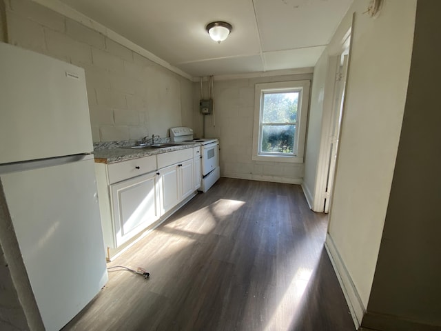 kitchen featuring dark wood-type flooring, white appliances, sink, and white cabinets