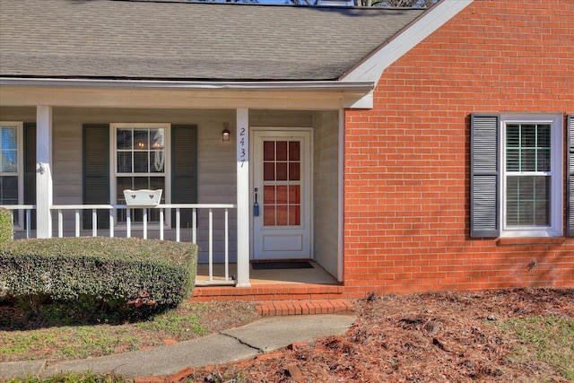 doorway to property featuring a porch