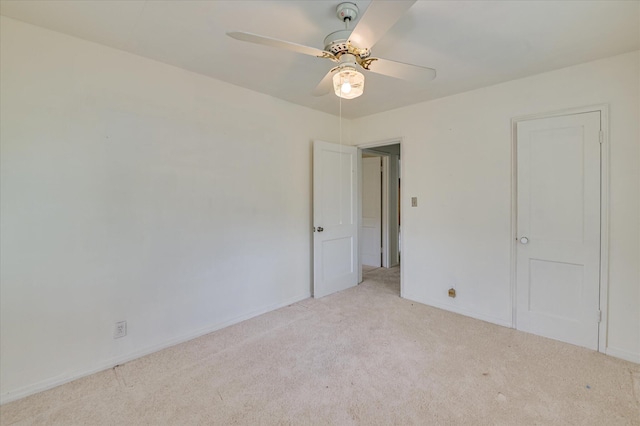 2454 Ridge Rd, Augusta, GA 30906 - unfurnished bedroom with light colored carpet, baseboards, and a ceiling fan