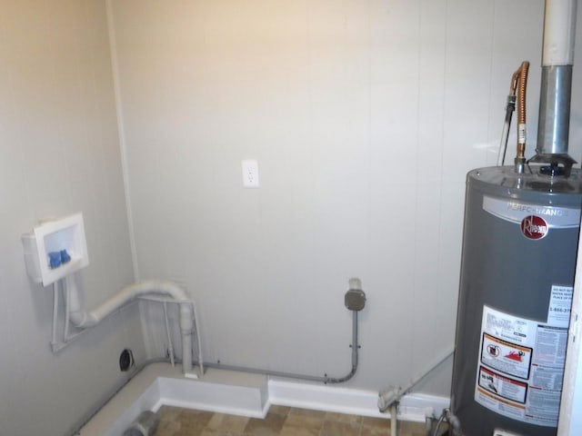 utility room with gas water heater