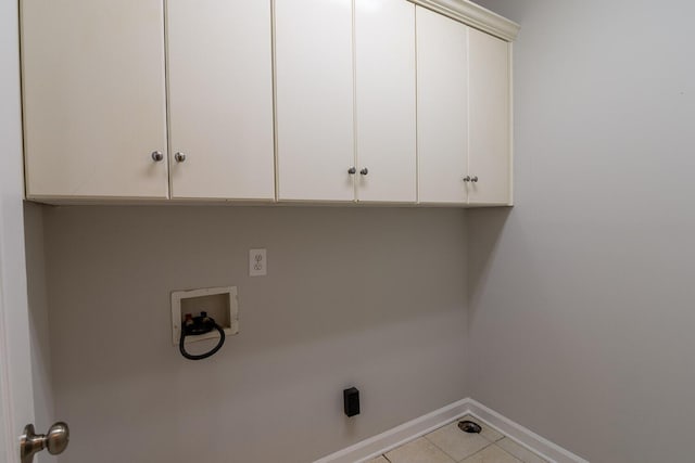 1036 Hampstead Pl, Martinez, GA 30907 - laundry room with cabinet space, washer hookup, and light tile patterned floors