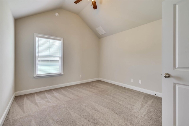 interior space with vaulted ceiling and ceiling fan