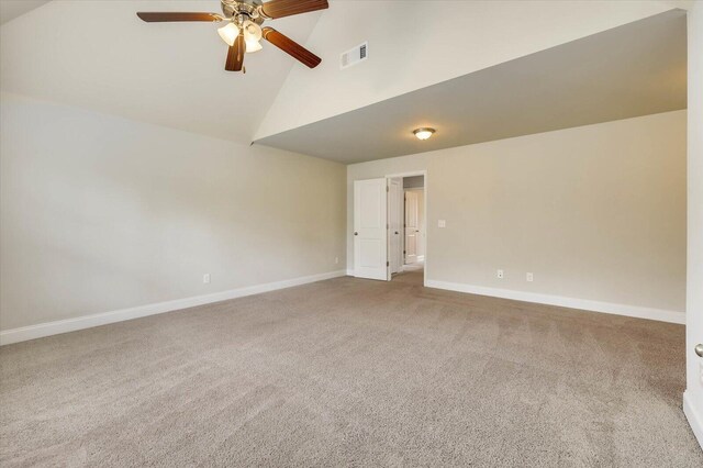 unfurnished room featuring carpet flooring, ceiling fan, and high vaulted ceiling