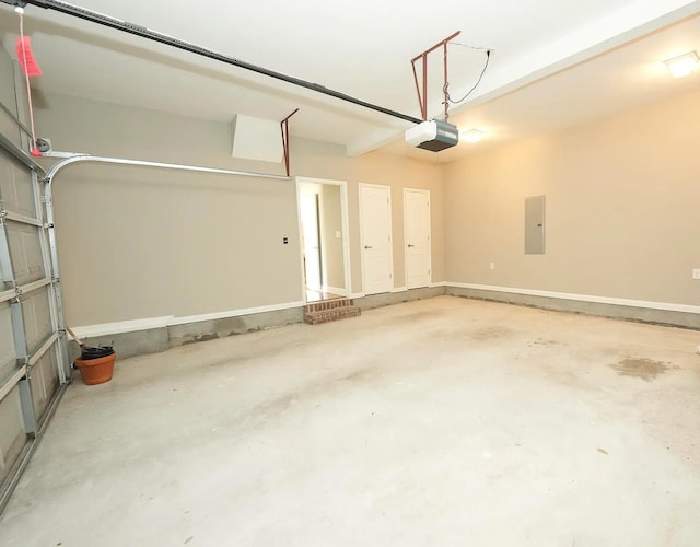 garage featuring a garage door opener and electric panel