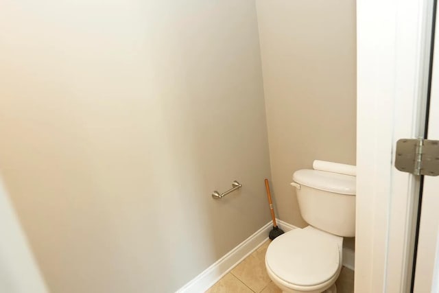 bathroom featuring tile patterned floors and toilet