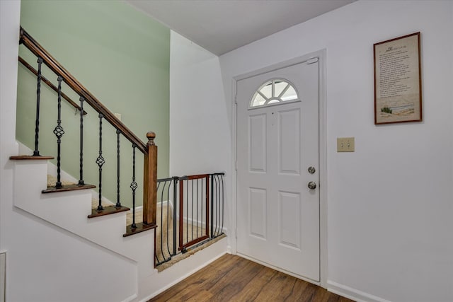 864 Chase Rd, Evans, GA 30809 - entryway featuring dark wood-style flooring, baseboards, and stairs