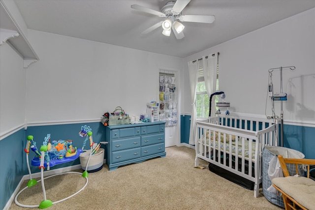 864 Chase Rd, Evans, GA 30809 - carpeted bedroom with a nursery area, ceiling fan, and baseboards