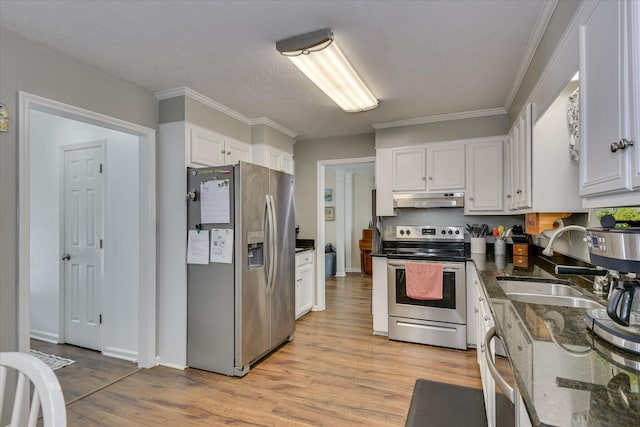 864 Chase Rd, Evans, GA 30809 - kitchen featuring appliances with stainless steel finishes, under cabinet range hood, a sink, white cabinetry, and ornamental molding